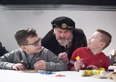 Henry VIII meets two younger visitors