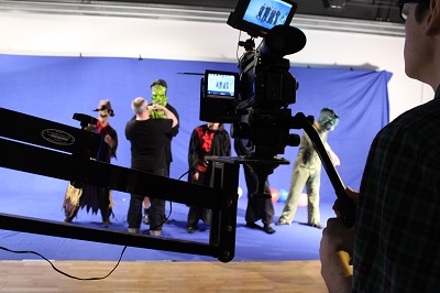 The actors being filming in monster costume against a screen